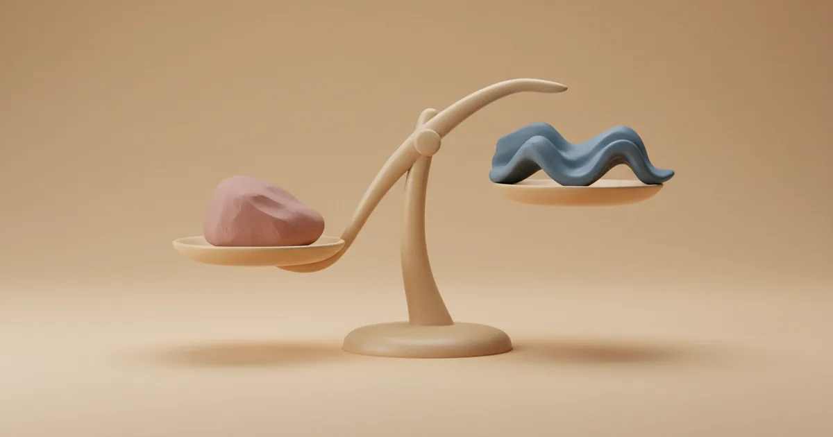 Clay-rendered balance scale with contrasting weighted elements in equilibrium